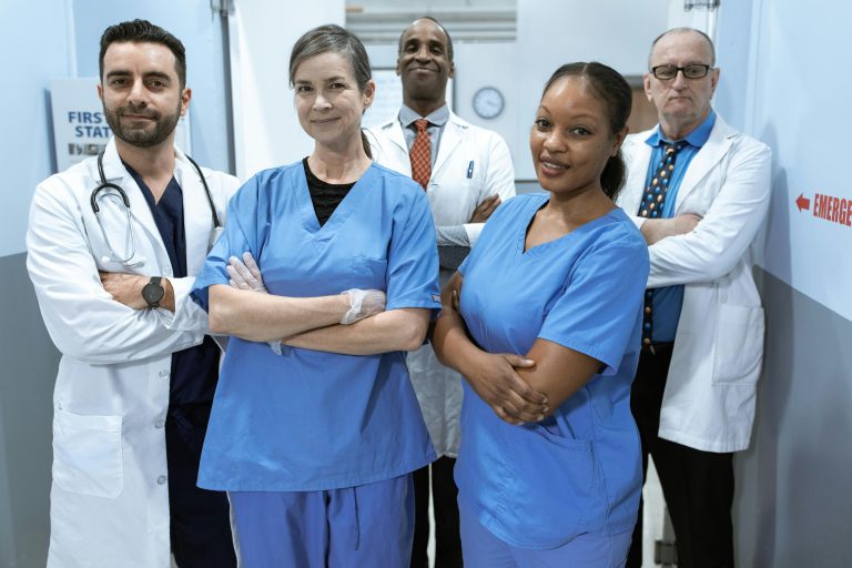 Photo by RDNE Stock project: https://www.pexels.com/photo/doctors-and-nurses-in-a-hospital-6129507/